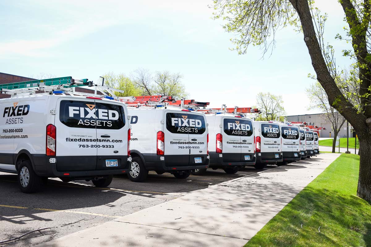 Fixed Assets Back Of Work Vans Parked 01